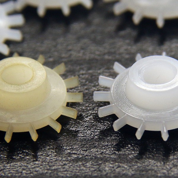 micro injection molded POM clock part based on sample on the left